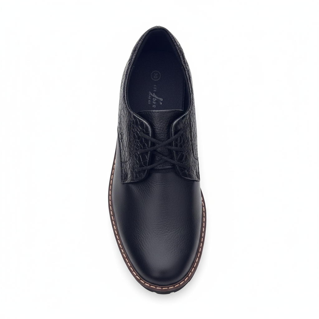 Vista aérea zapato oxford negro con cordones y texturas mixtas Ref 8106